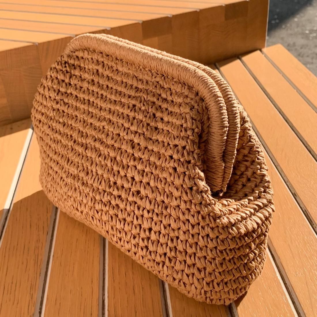 Straw clutch bag