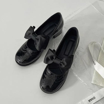 Manish bow loafers