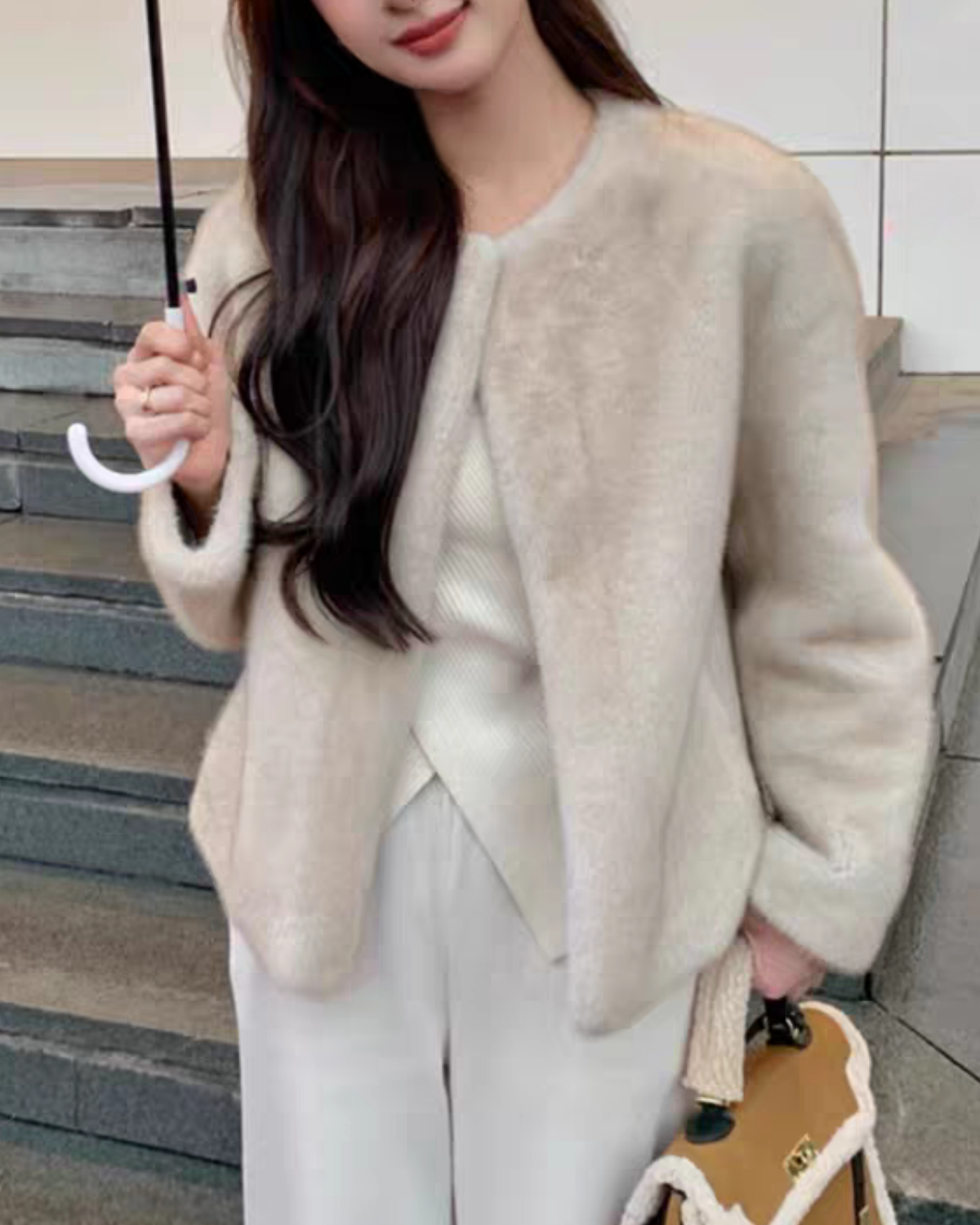Elegant no-collar fur jacket