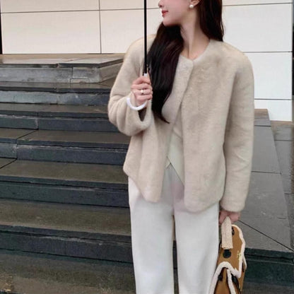Elegant no-collar fur jacket