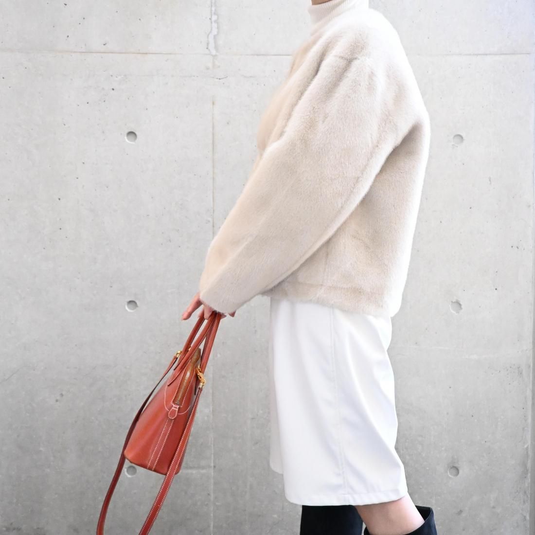 Elegant no-collar fur jacket