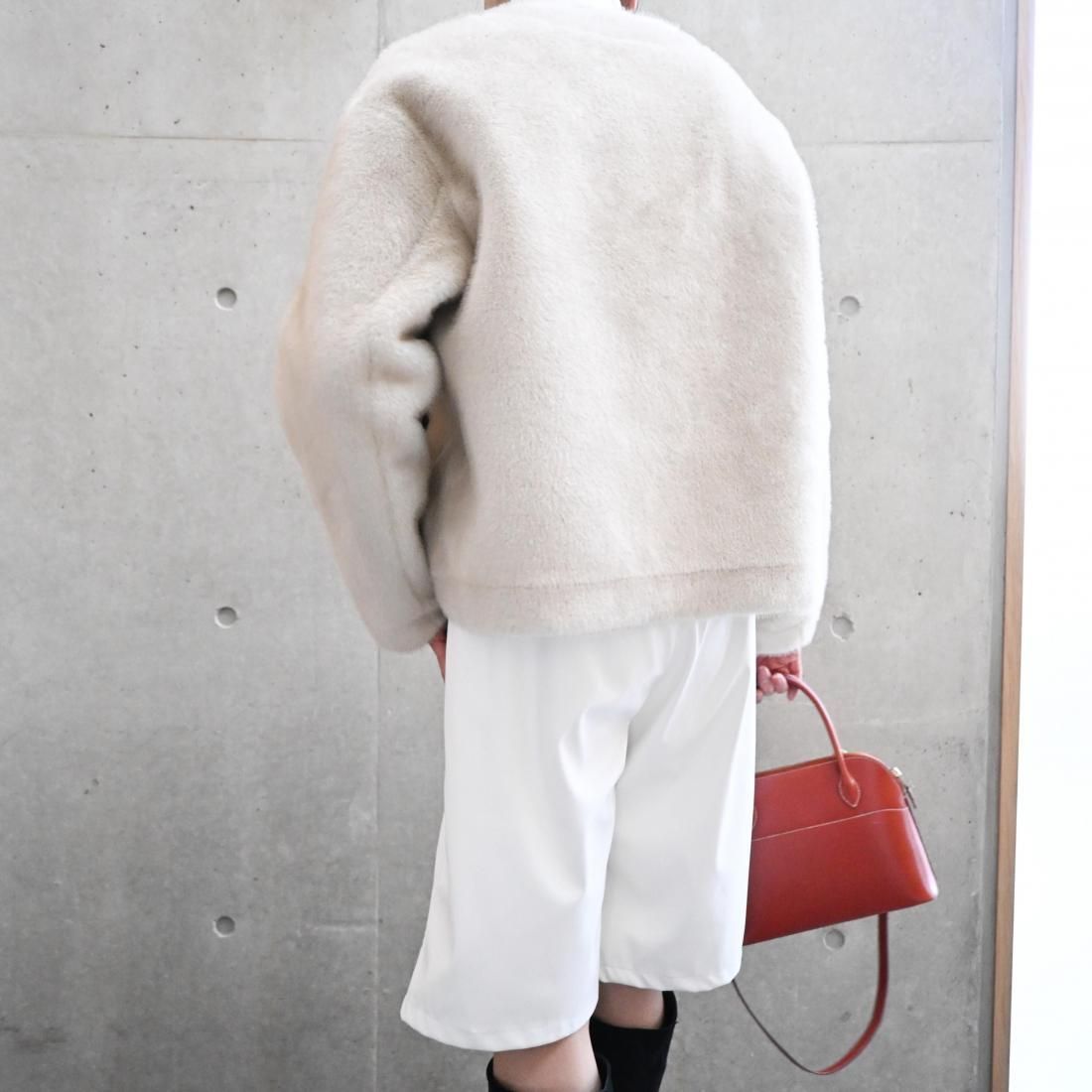 Elegant no-collar fur jacket