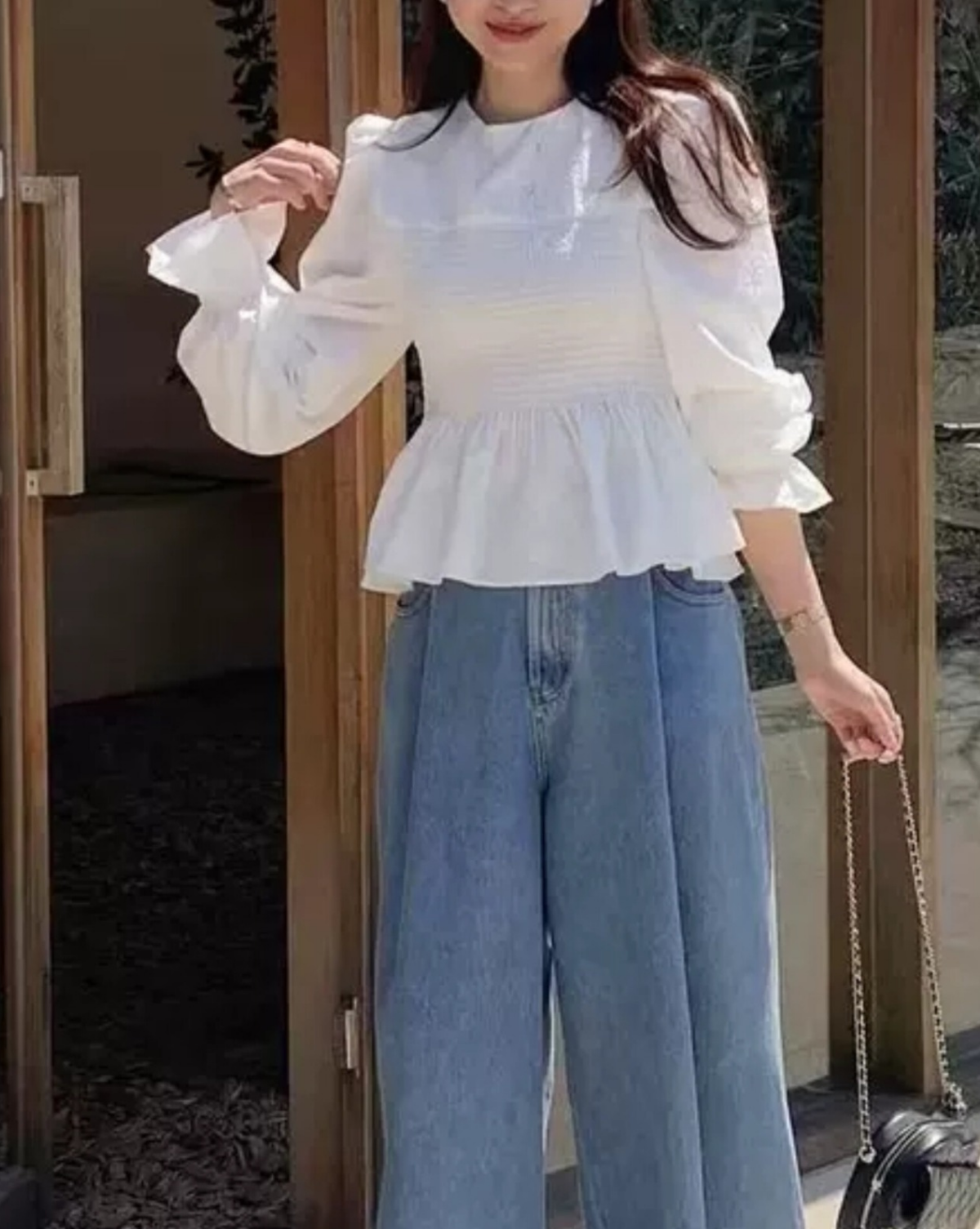 Smocked peplum blouse