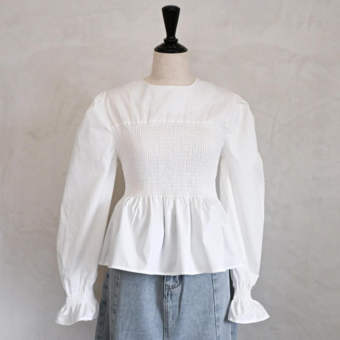 Smocked peplum blouse