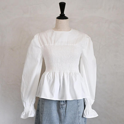 Smocked peplum blouse