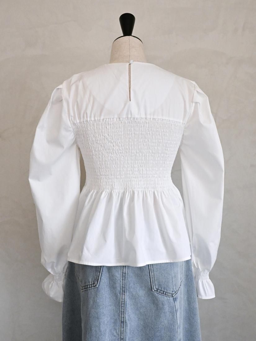 Smocked peplum blouse