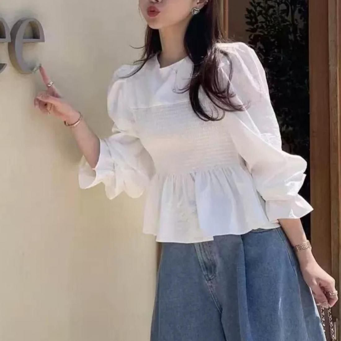 Smocked peplum blouse