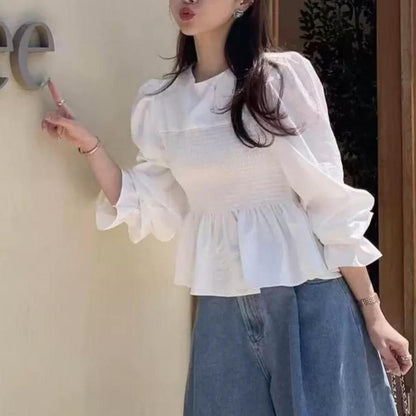 Smocked peplum blouse