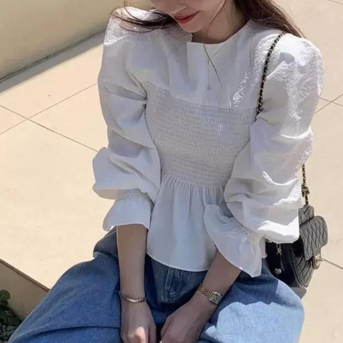 Smocked peplum blouse