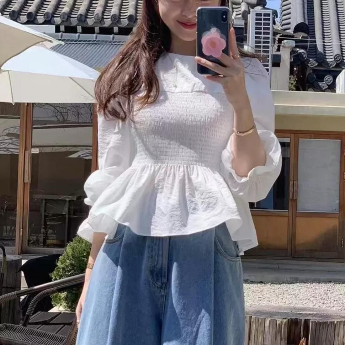 Smocked peplum blouse