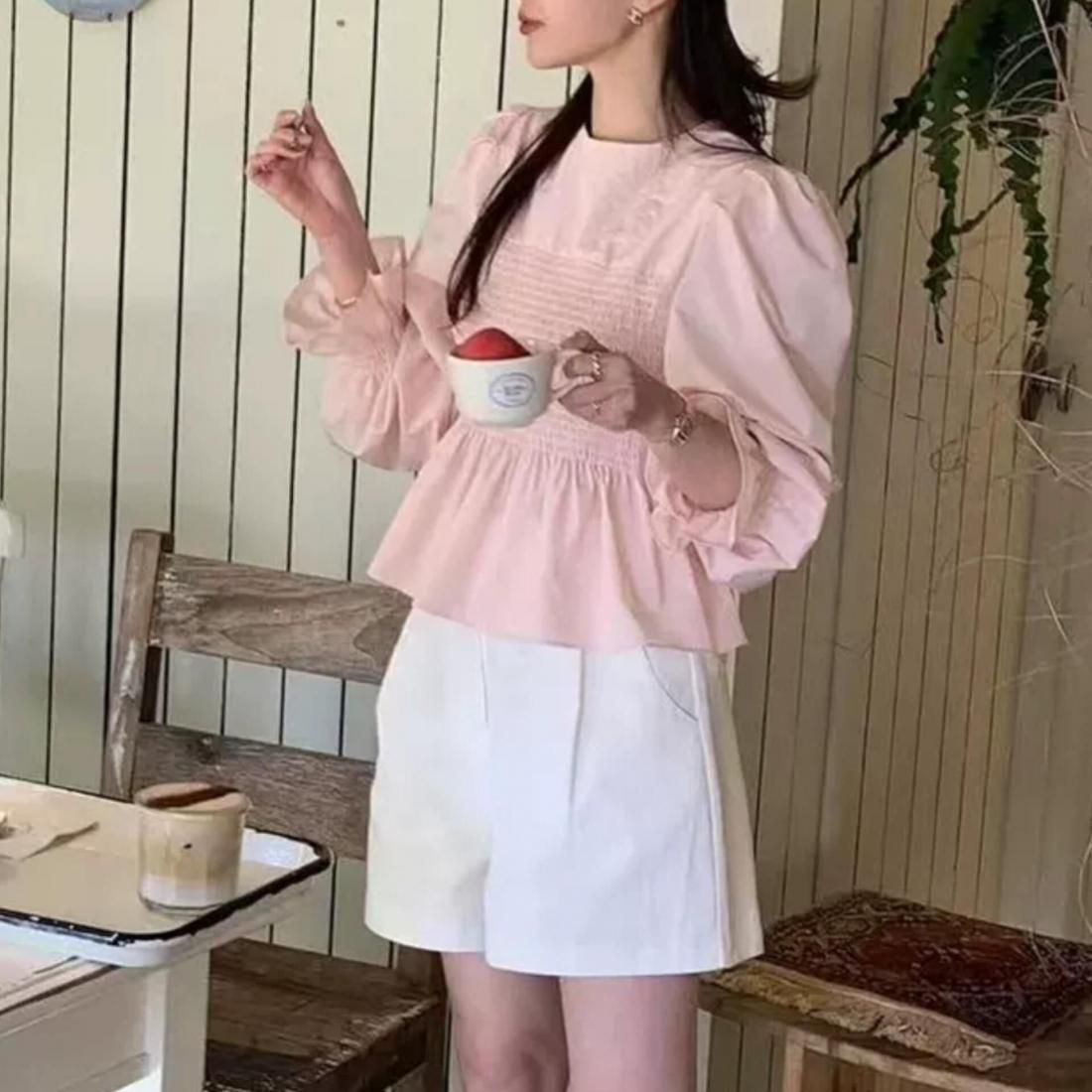 Smocked peplum blouse