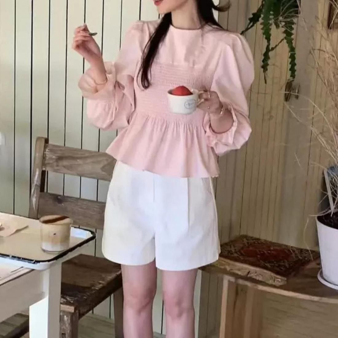 Smocked peplum blouse