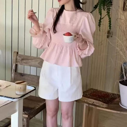 Smocked peplum blouse